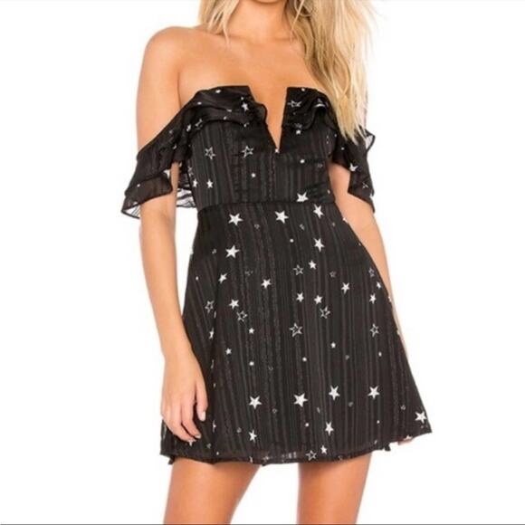 About Us Revolve Black Off Shoulder Silver Star Mini Dress Size XXS Deep V Neck - Picture 1 of 7